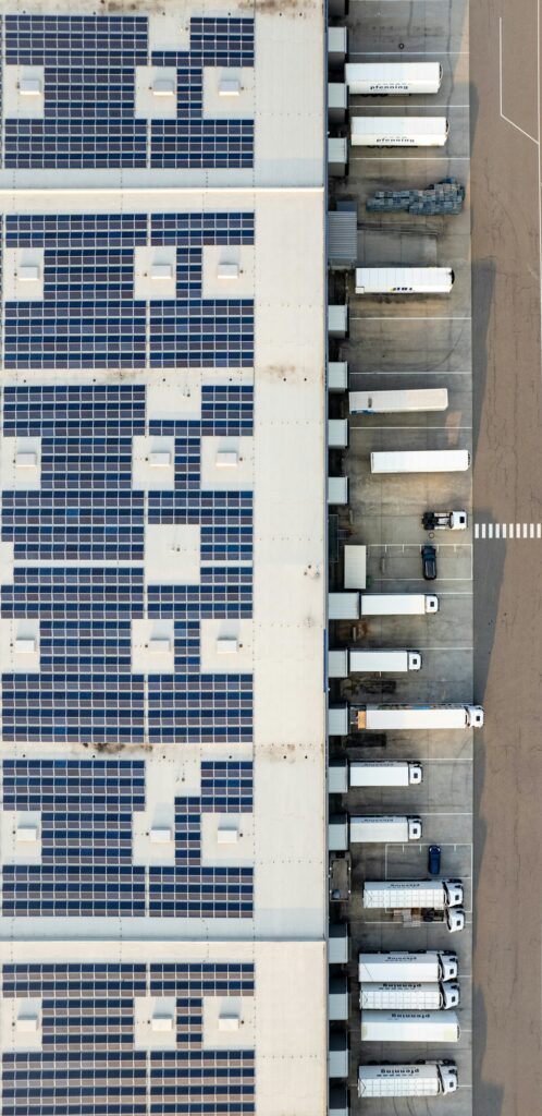 Aerial view of a commercial warehouse and loading area.